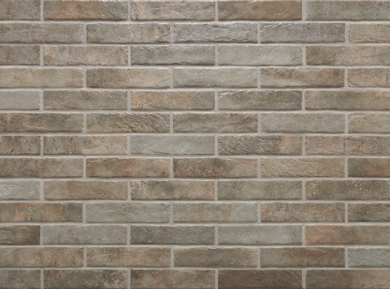 Dettaglio piastrella per pavimento e rivestimento in gres porcellanato effetto mattoncino opaco 6x25 cm della collezione Recovery Stone, colore Mud di Ceramica Rondine