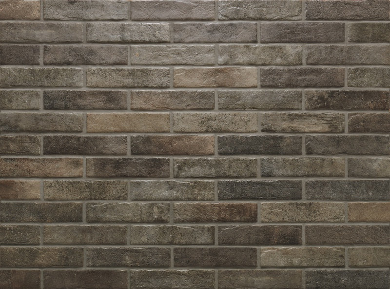 Dettaglio piastrella per pavimento e rivestimento in gres porcellanato effetto mattoncino opaco 6x25 cm della collezione Recovery Stone, colore Old Brown di Ceramica Rondine