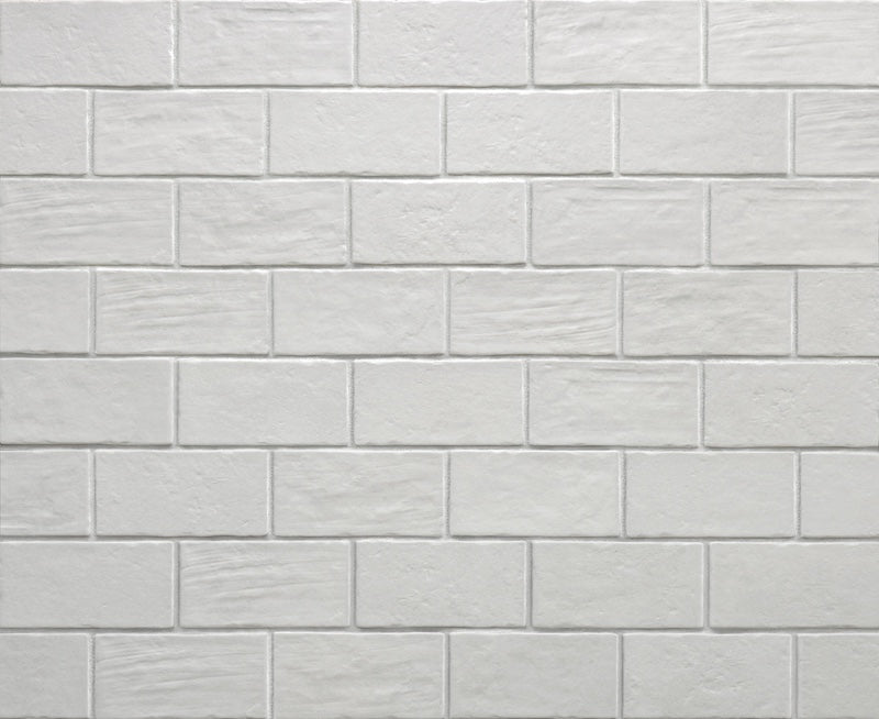 Dettaglio piastrella per pavimento e rivestimento in gres porcellanato effetto cotto opaco 13x25 cm della collezione Recovery Stone, colore Total White di Ceramica Rondine