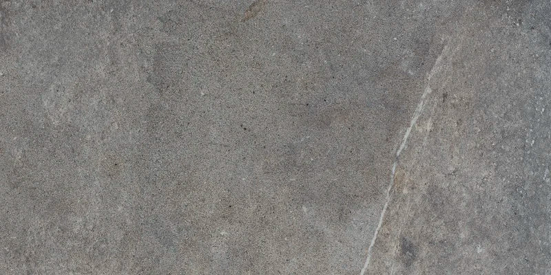 Piastrella in gres porcellanato effetto pietra naturale della collezione Pietre di Fiume di Ceramica Rondine, formato 30x60 cm, colore Antracite