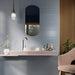 Bagno moderno con rivestimento in pasta bianca effetto tinta unita della collezione Pastel di Savoia Italia, formato 20x60 cm, colore Denim Matt