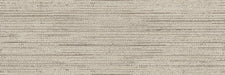 Dettaglio piastrella da rivestimento effetto rigato leggermente a rilievo opaco con riflessi lucidi della collezione Pietra di Luna di Paul & Co Ceramiche, formato 25x75, colore Astro Sabbia