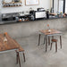 Bar con pavimento e rivestimento bancone in gres porcellanato effetto pietra naturale della collezione Pietre di Fiume di Ceramica Rondine, formato 60x120 cm, colore Grigio