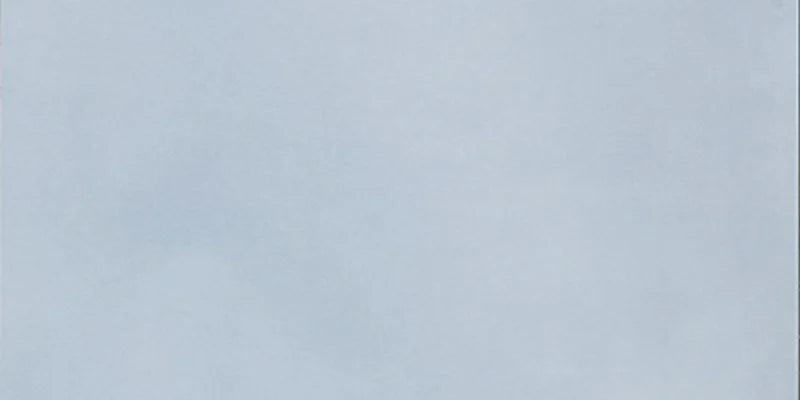 Dettaglio piastrella in gres porcellanato effetto cemento nuvolato della collezione R-Evolution di Casalgrande, formato 30x60 cm, colore Azure