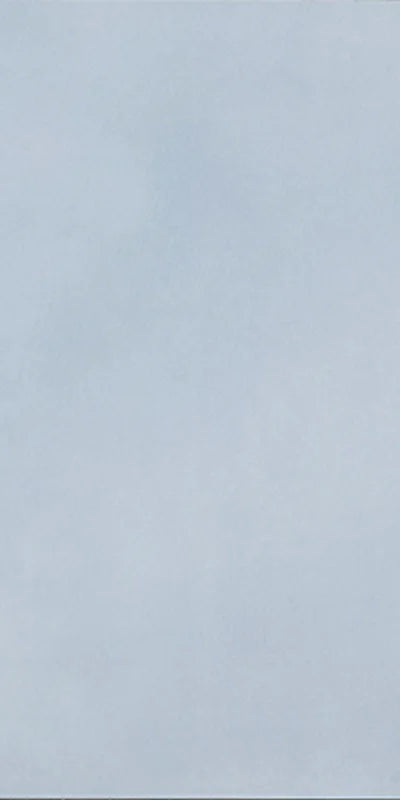 Dettaglio piastrella in gres porcellanato effetto cemento nuvolato della collezione R-Evolution di Casalgrande, formato 60x120 cm, colore Azure