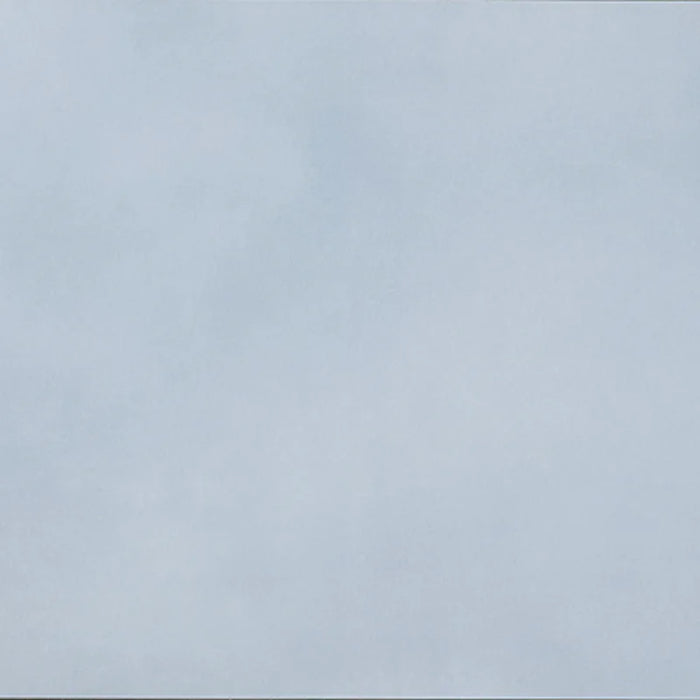 Dettaglio piastrella in gres porcellanato effetto cemento nuvolato della collezione R-Evolution di Casalgrande, formato 60x60 cm, colore Azure