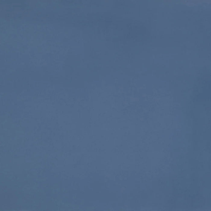 Dettaglio piastrella in gres porcellanato effetto cemento nuvolato della collezione R-Evolution di Casalgrande, formato 60x60 cm, colore Blue