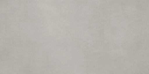 Dettaglio piastrella in gres porcellanato effetto cemento nuvolato della collezione R-Evolution di Casalgrande, formato 30x60 cm, colore Grey