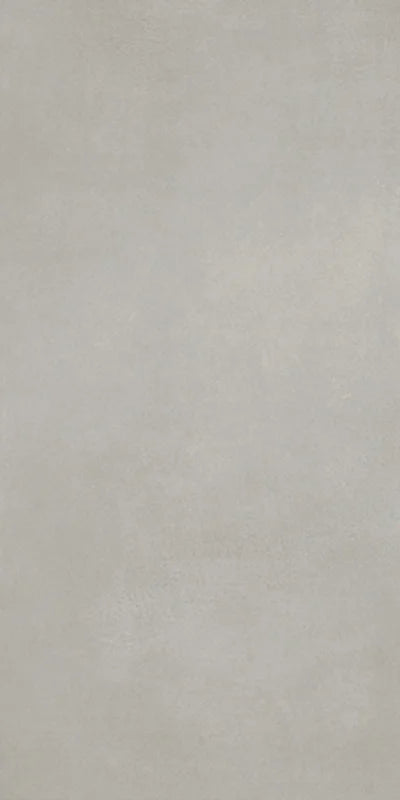 Dettaglio piastrella in gres porcellanato effetto cemento nuvolato della collezione R-Evolution di Casalgrande, formato 60x120 cm, colore Grey