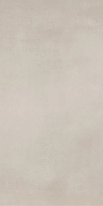 Dettaglio piastrella in gres porcellanato effetto cemento nuvolato della collezione R-Evolution di Casalgrande, formato 60x120 cm, colore Sand