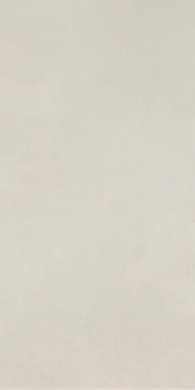 Dettaglio piastrella in gres porcellanato effetto cemento nuvolato della collezione R-Evolution di Casalgrande, formato 60x120 cm, colore Total White