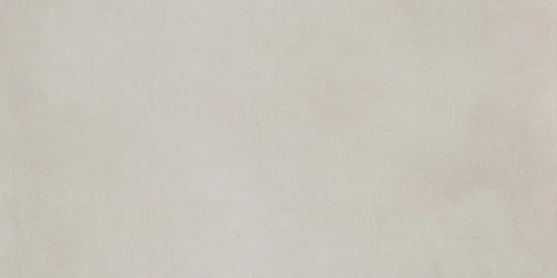 Dettaglio piastrella in gres porcellanato effetto cemento nuvolato della collezione R-Evolution di Casalgrande, formato 30x60 cm, colore White