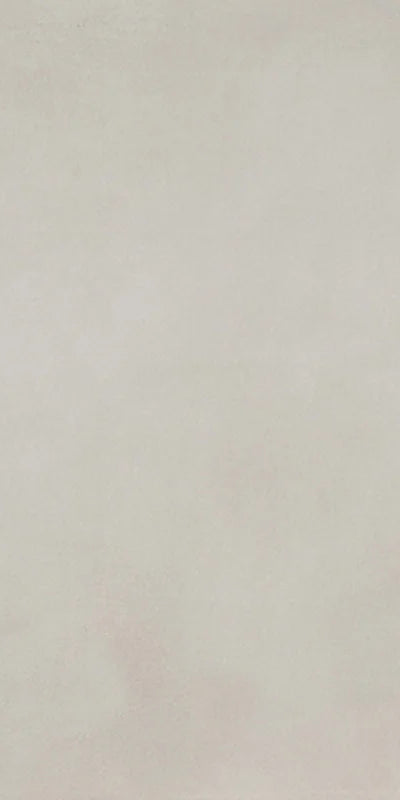 Dettaglio piastrella in gres porcellanato effetto cemento nuvolato della collezione R-Evolution di Casalgrande, formato 60x120 cm, colore White