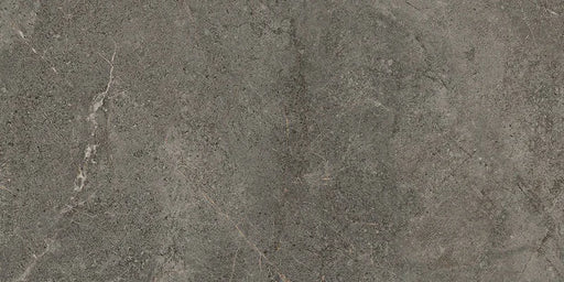 Piastrella Glow Stone Carbon di Herberia Ceramiche in gres porcellanato effetto pietra con riflessi metallici 30x60 cm per pavimenti e rivestimenti contemporanei