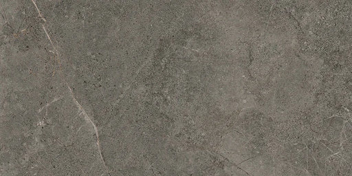 Piastrella Glow Stone Carbon di Herberia Ceramiche in gres porcellanato effetto pietra con riflessi metallici 30x60 cm per pavimenti e rivestimenti contemporanei