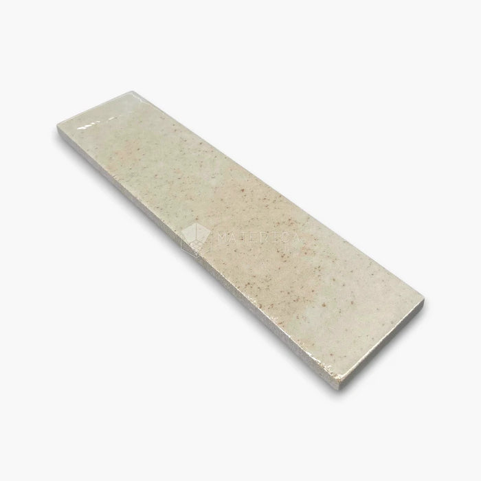 Foto piastrella da rivestimento in gres porcellanato effetto mattoncino lucido 6x25 cm, collezione Soho Ivory di Ceramica Rondine. Piastrelle avorio per pareti di bagno e cucina.