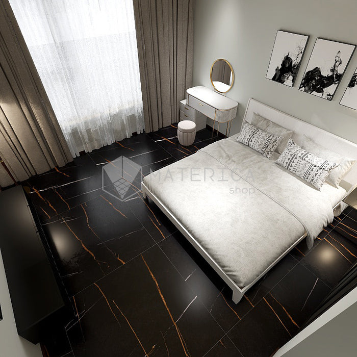 Camera da letto con pavimento dal design sofisticato ed elegante in gres porcellanato effetto marmo opaco, ideale per ambienti moderni e raffinati. Collezione La Marmoteca di Gardenia Orchidea, formato 120x120 cm, colore Sahara Noir