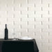 Muro con rivestimento ceramico effetto mattoncino tridimensionale opaco 7,5x30 cm della collezione Skema, colore Matt White di Ceramica Settecento