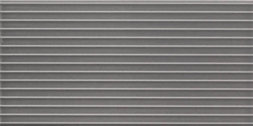 Dettaglio piastrella da rivestimento in pasta bianca effetto rigato a rilievo della collezione Sketches di Ceramica settecento, formato 10x20 cm, colore Charcoal Hor 1