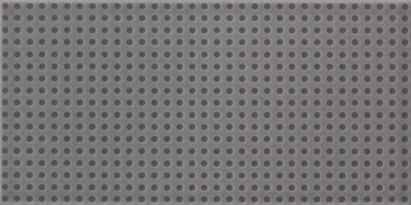 Dettaglio piastrella da rivestimento in pasta bianca effetto puntinato a rilievo della collezione Sketches di Ceramica settecento, formato 10x20 cm, colore Charcoal Dots