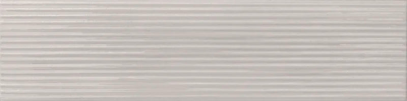 Dettaglio piastrella da rivestimento in formato mattoncino Lucido 7,5x30, rigato a rilievo, colore Silver, collezione Swing di ceramica Settecento