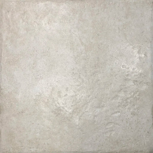 Piastrella semilucida in gres porcellanato effetto pietra leccese della collezione Terre d'Otranto di Ceramica Rondine, formato 40x40 cm con bordo naturale, colore Blend