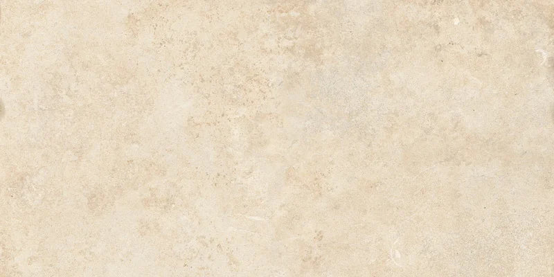 Piastrella in gres porcellanato effetto pietra leccese della collezione Terre d'Otranto di Ceramica Rondine, formato 30x60 cm con bordo naturale, colore Cream