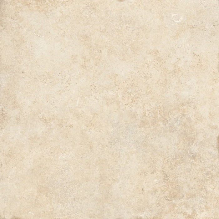 Piastrella in gres porcellanato effetto pietra leccese della collezione Terre d'Otranto di Ceramica Rondine, formato 60x60 cm con bordo naturale, colore Cream