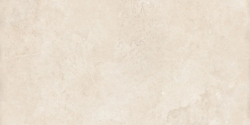 Piastrella in gres porcellanato effetto pietra leccese della collezione Terre d'Otranto di Ceramica Rondine, formato 30x60 cm con bordo naturale, colore Ivory