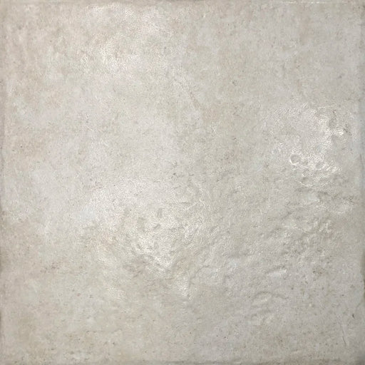 Piastrella semilucida in gres porcellanato effetto pietra leccese della collezione Terre d'Otranto di Ceramica Rondine, formato 40x40 cm con bordo naturale, colore Ivory