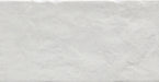 Dettaglio piastrella per pavimento e rivestimento in gres porcellanato effetto cotto opaco 13x25 cm della collezione Recovery Stone, colore Total White di Ceramica Rondine