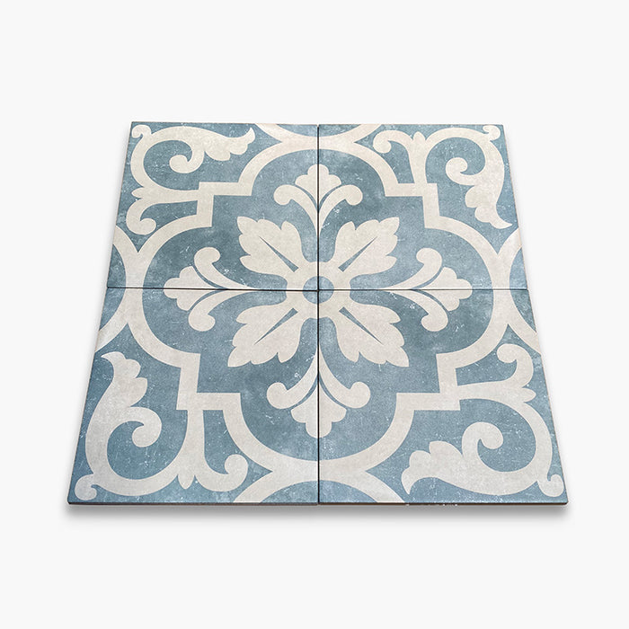 foto composizione quattro piastrelle da pavimento e rivestimento in gres porcellanato serie Talé di Savoia Italia, Decoro effetto cementina Makari formato 21x21 Colore Blu