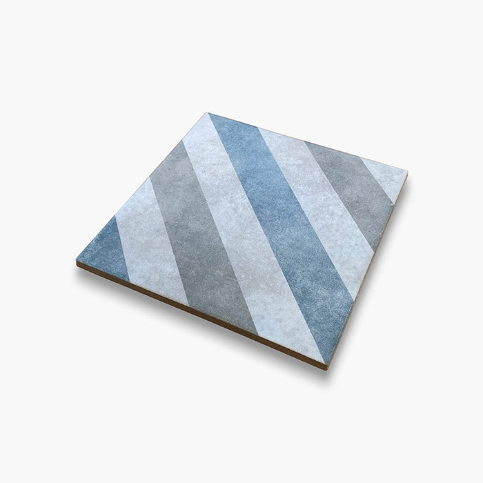 Foto piastrella da pavimento e rivestimento in gres porcellanato serie Talé di Savoia Italia, Decoro effetto cementina Mix Occidentale formato 21x21 Colore Blu