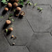 Dettaglio pavimento in gres porcellanato serie Terra di Marca Corona, effetto cotto, formato esagonale 25x21.6 cm, Colore Nero Esagona