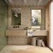 Dettaglio bagno moderno con pavimento e rivestimento in gres porcellanato serie Terracreta di Marca Corona, effetto cementina, formato 25x22 cm, Colore Casello Chamotte