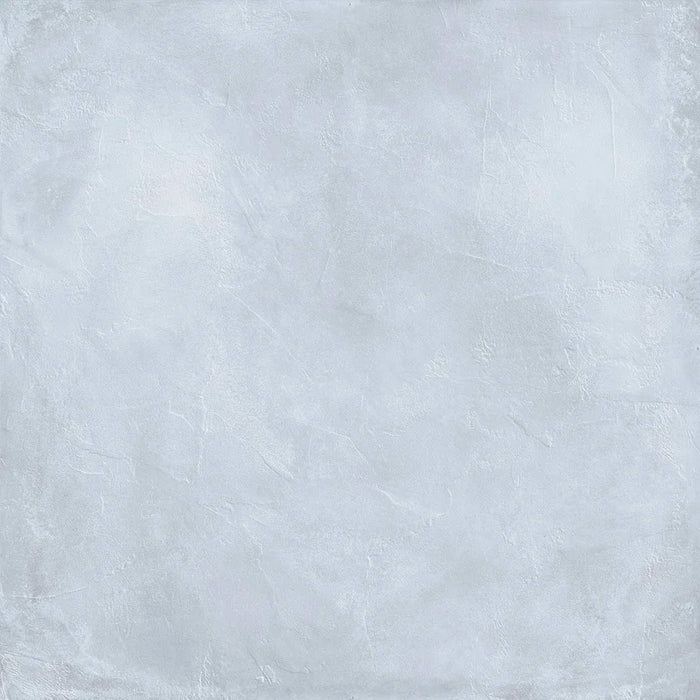 Piastrella per pavimento interno in gres porcellanato effetto cemento spatolato della collezione Terre Vive di Savoia Italia, formato 90x90 cm, colore Cielo