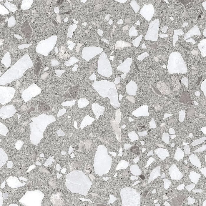 Dettaglio piastrella in gres porcellanato effetto graniglia e marmetta. Collezione Venexia di Alfalux, formato 20x20 cm, colore Murano Grigio con marmette grigie e bianche