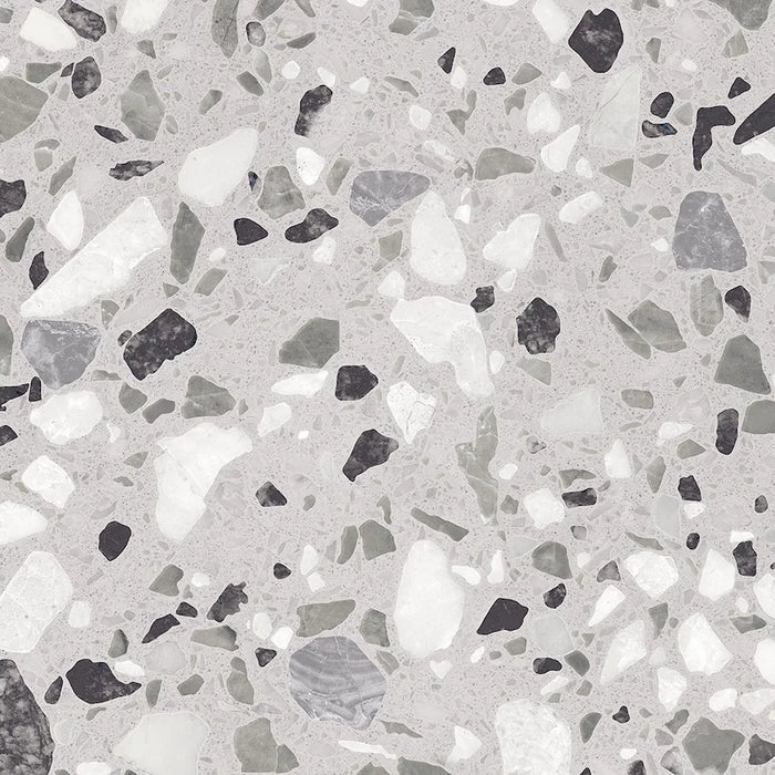 Dettaglio piastrella in gres porcellanato effetto graniglia e marmetta. Collezione Venexia di Alfalux, formato 20x20 cm, colore Tronchetto Grigio con marmette grigie, nere e bianche