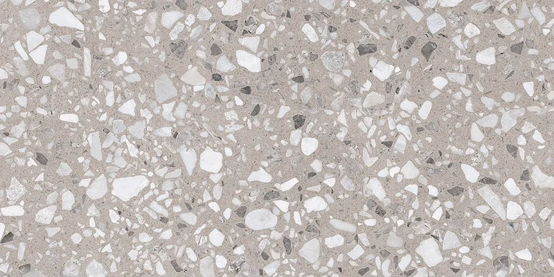 Dettaglio piastrella in gres porcellanato effetto graniglia e marmetta. Collezione Venexia di Alfalux, formato 30x60 cm, colore Cannaregio Tortora con marmette grigie e avorio