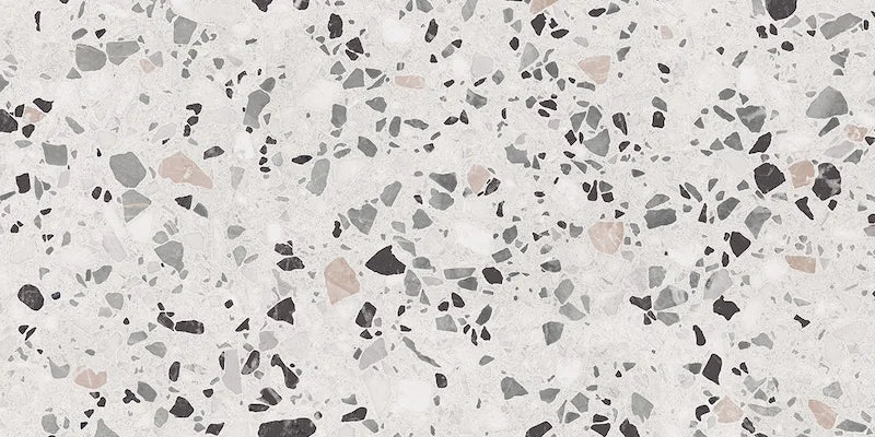 Dettaglio piastrella in gres porcellanato effetto graniglia e marmetta. Collezione Venexia di Alfalux, formato 30x60 cm, colore Giudecca Avorio con marmette grigie, bianche e beige