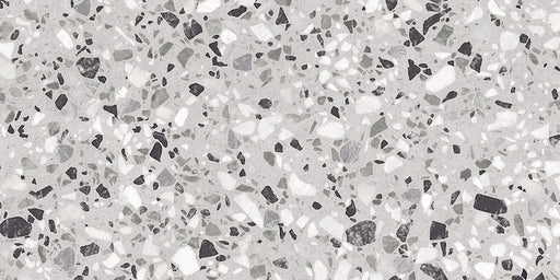 Dettaglio piastrella in gres porcellanato effetto graniglia e marmetta. Collezione Venexia di Alfalux, formato 30x60 cm, colore Tronchetto Grigio con marmette grigie, bianche e nere