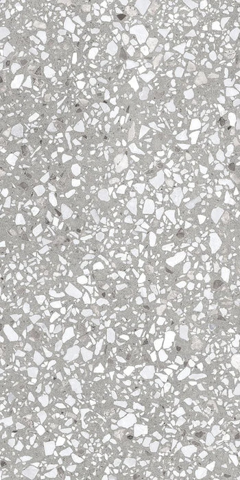 Dettaglio piastrella in gres porcellanato effetto graniglia e marmetta. Collezione Venexia di Alfalux, formato 60x120 cm, colore Murano Grigio con marmette grigie e avorio