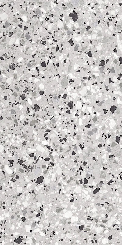 Dettaglio piastrella in gres porcellanato effetto graniglia e marmetta. Collezione Venexia di Alfalux, formato 60x120 cm, colore Tronchetto Grigio con marmette grigie, bianche e nere