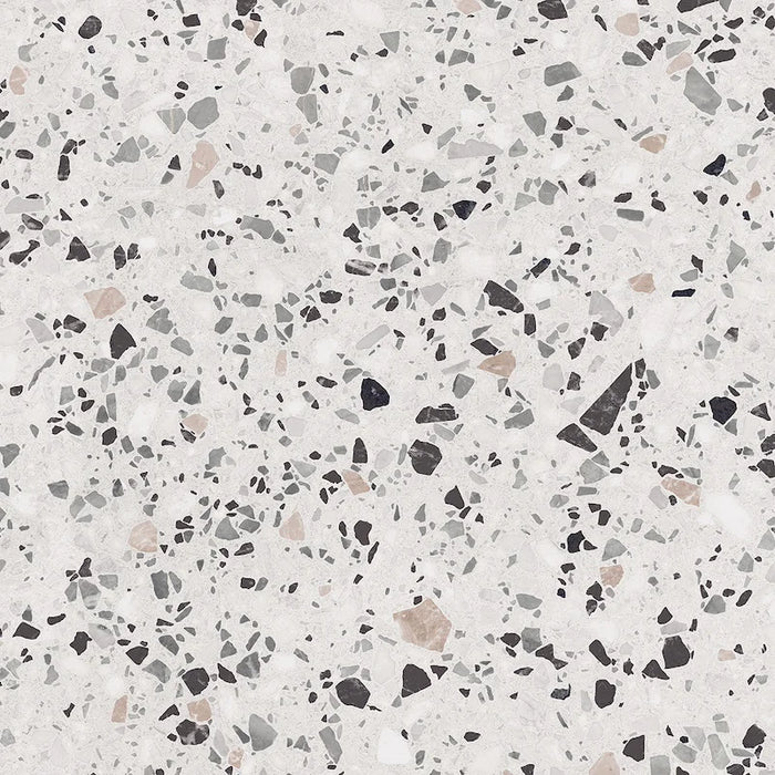 Dettaglio piastrella in gres porcellanato effetto graniglia e marmetta. Collezione Venexia di Alfalux, formato 60x60 cm, colore Giudecca Avorio con marmette grigie, bianche, marroni e nere