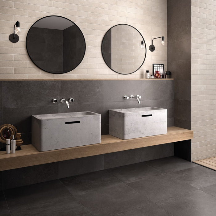 ambientazione di piastrelle della serie moov anthracite di ceramiche keope in formato 60x120 finitura R9 naturale da interno