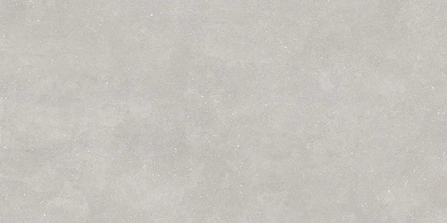 Dettaglio piastrella in gres porcellanato effetto cemento nuvolato per esterni con bordo bocciardato della collezione Concept di Casalgrande, formato 30x60 cm, colore Grey