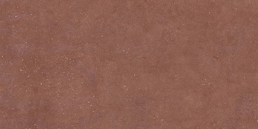 Dettaglio piastrella in gres porcellanato effetto cemento nuvolato della collezione Concept di Casalgrande, formato 30x60 cm, colore Red