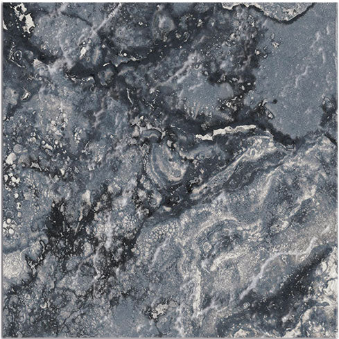 Dettaglio piastrella per pavimento e rivestimento in gres porcellanato effetto pietra spaziale. Collezione Swimming Planet di Ceramica Valsecchia, formato 15x15, Jupiter Black