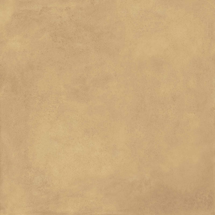 Dettaglio piastrella in gres porcellanato effetto metallo. Plate di ceramiche keope 120x120 colore Brass