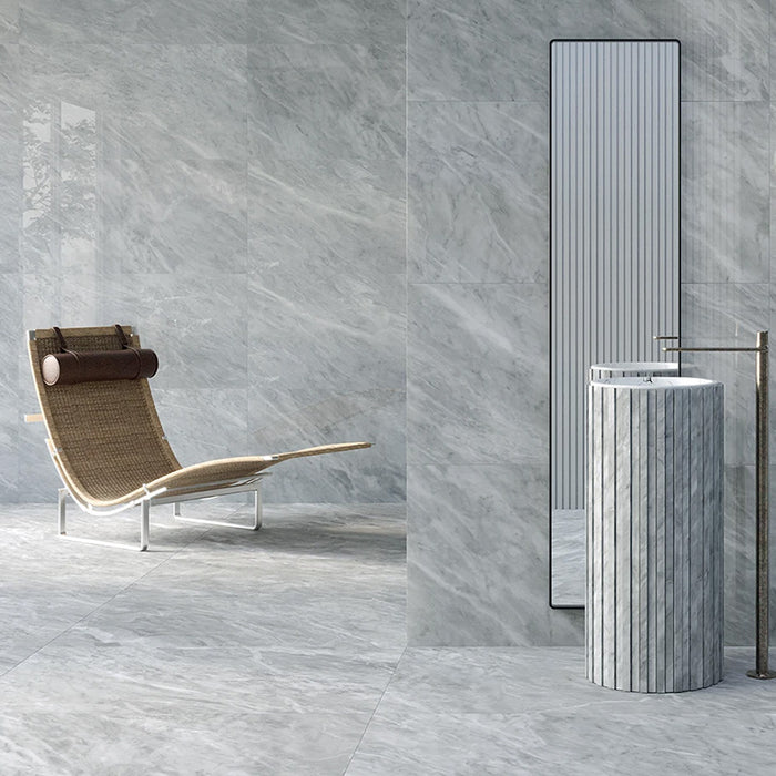 Spa con pavimento e rivestimento in gres porcellanato effetto marmo grigio della collezione Versilia di Ceramiche Keope, formato 60x120, colore Nuvolato Grey